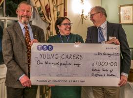 Two Rotary Presidents present cheque to Alice Stevenson